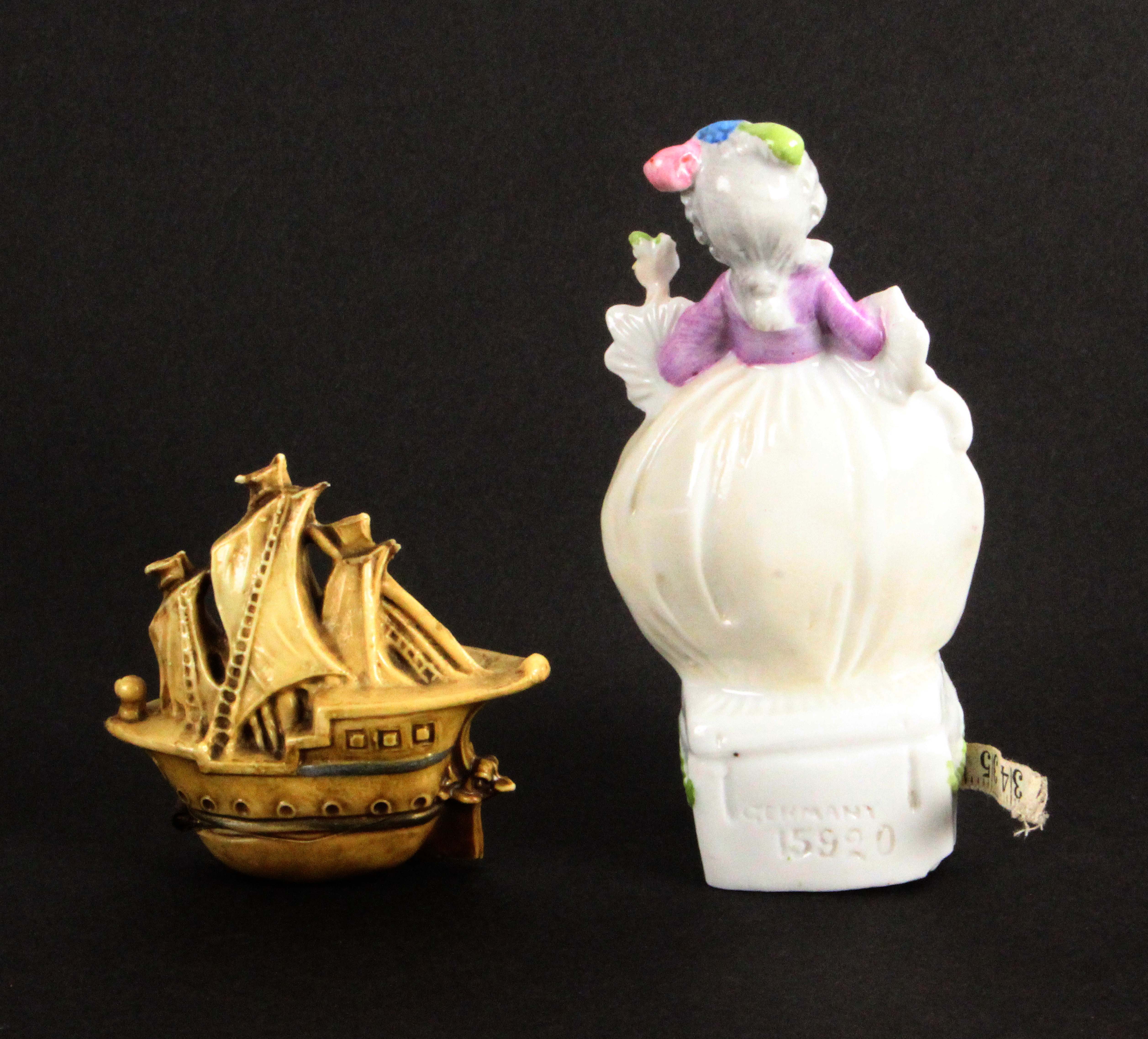 Two novelty tape measures, comprising a celluloid example in the form of a galleon, complete - Image 2 of 2