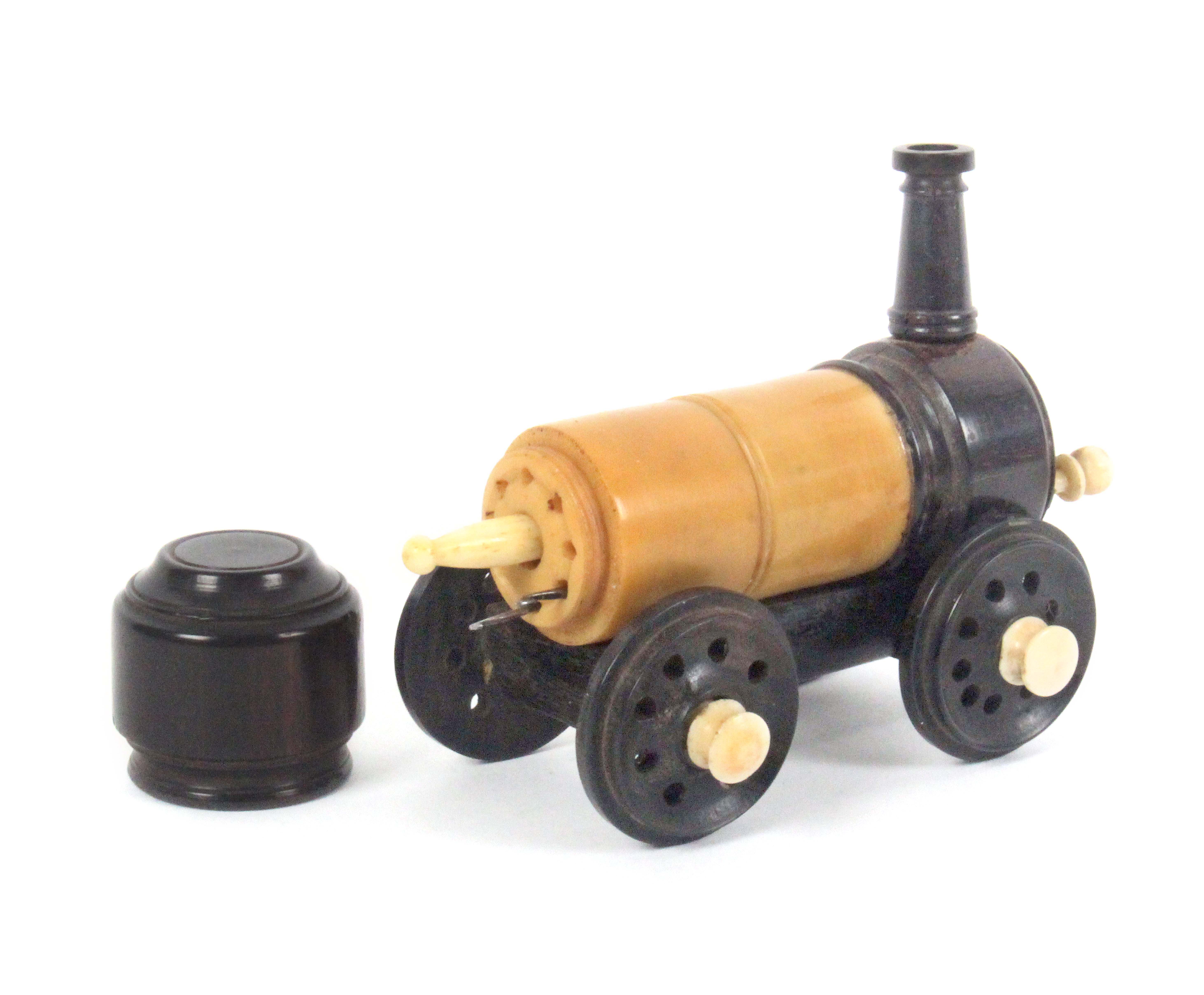 A rare crochet set contained in a model of a steam locomotive, in vegetable ivory, rosewood and - Image 3 of 3