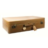 Asprey - London, a light tan leather suitcase, unused, rectangular, brass Sesamee combination