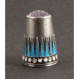 A Norwegian silver and enamel thimble, the frieze with blue enamel stalectites over a border of