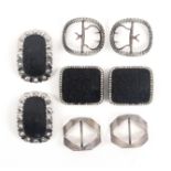 Four pairs of 19th Century shoe buckles, comprising an oval curved pair with cut steel borders,