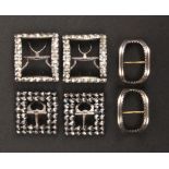 Three pairs of 19th Century shoe buckles, comprising a pair of silver mounted examples with open