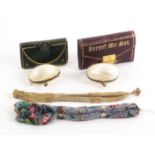 Purses, comprising a beadwork misers purse with steel rings, 17cms, another decorated in gilt