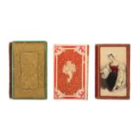 Three needle books, comprising a fine 19th Century ivory example the cover part stained in red and