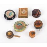 Seven tape measures, comprising a Mauchline ware example one side decorated with sea shells and