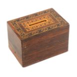 A Tunbridge ware rosewood money box, of rectangular form, the plain sides below a geometric mosaic