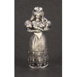 A 19th Century continental silver needle case, in the form of a bride in elaborate costume one