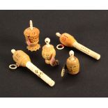 Five vegetable ivory tape measures, comprising two combination needle case examples in bone and