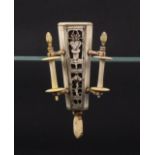 An 18th Century bone sewing clamp, ex Sylvia Groves collection, of octagonal tapering form pierced