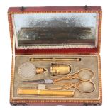 A good late 18th/early 19th Century French etui with gold fittings, probably Palais Royal, the red