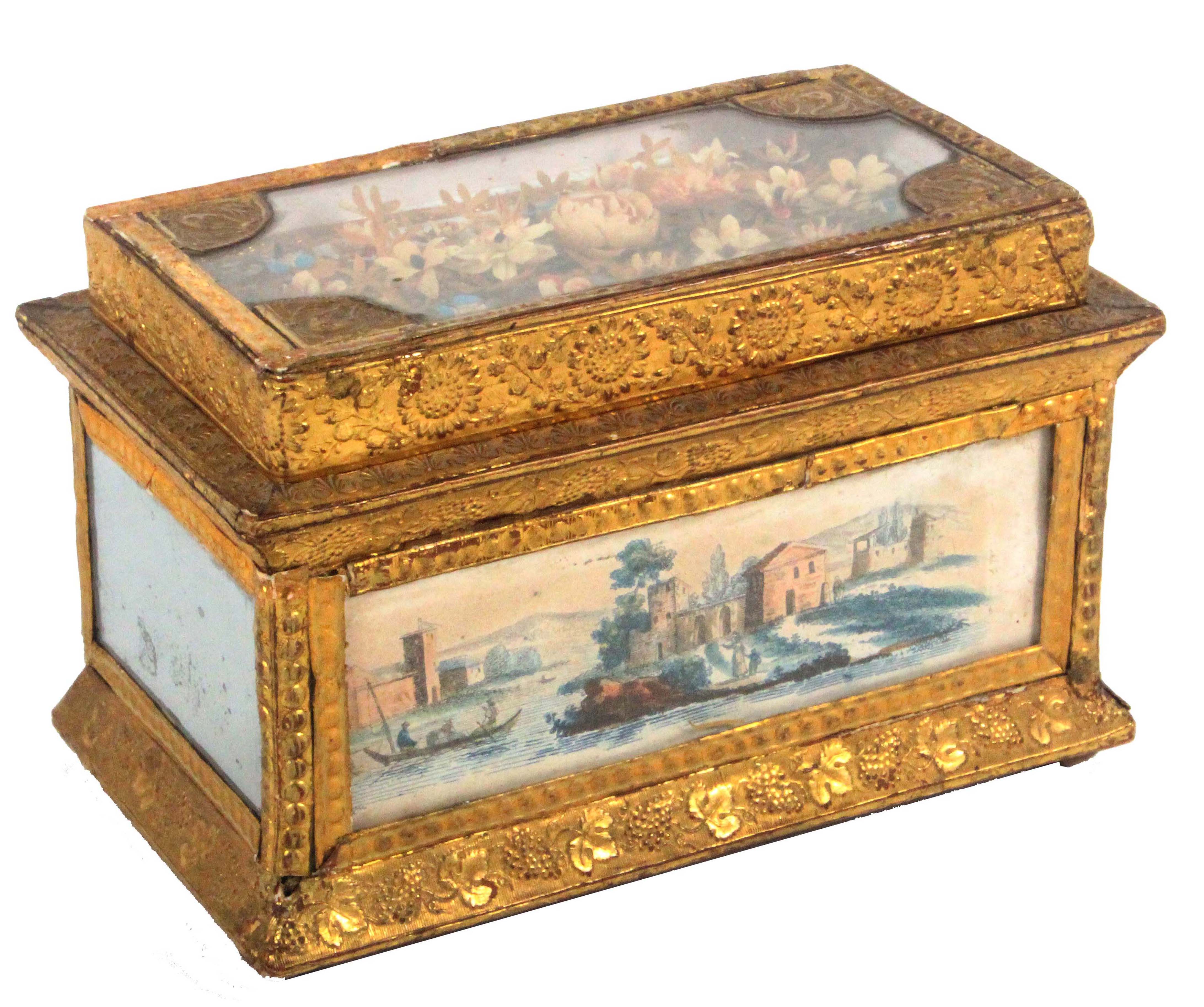 A good 19th Century French bonbonniere of elaborate rectangular form, the glazed lid with a