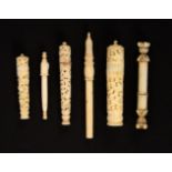 Six 19th Century ivory needle cases, comprising three carved Chinese examples of tapering form,
