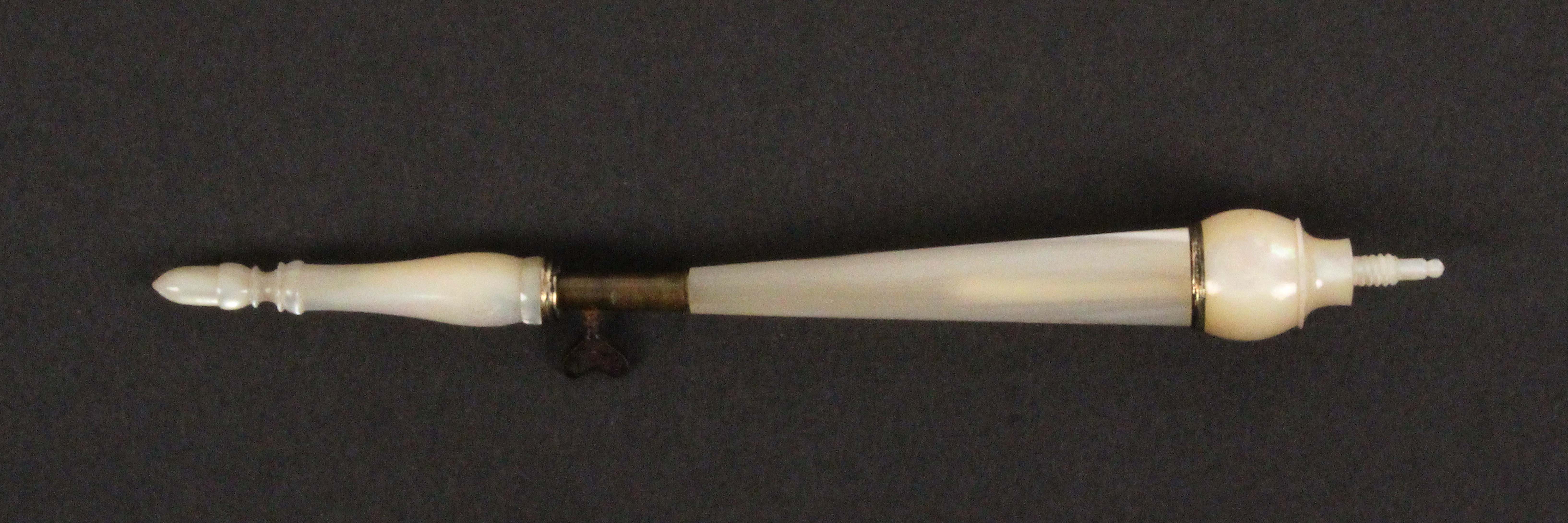 A mother of pearl tambour hook, probably Palais Royal, in three sections with brass collar and steel