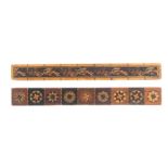 Two Tunbridge ware rulers, comprising a rosewood example divided into nine star form stick ware