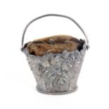 An early 19th Century silver pin cushion attributed to Joseph Taylor, in the form of a basket of