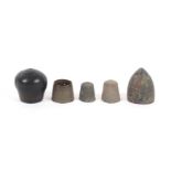 Five medieval excavated bronze and brass thimbles.    (5)