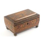 An early paint and print decorated Tunbridge ware sewing box of sarcophagal form, attributed to