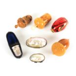Thimbles and thimble cases, comprising a vegetable ivory acorn example with reel, needle case and