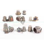 Five thimble and ring sets, Afghanistan, late 19th Century/early 20th Century and four other