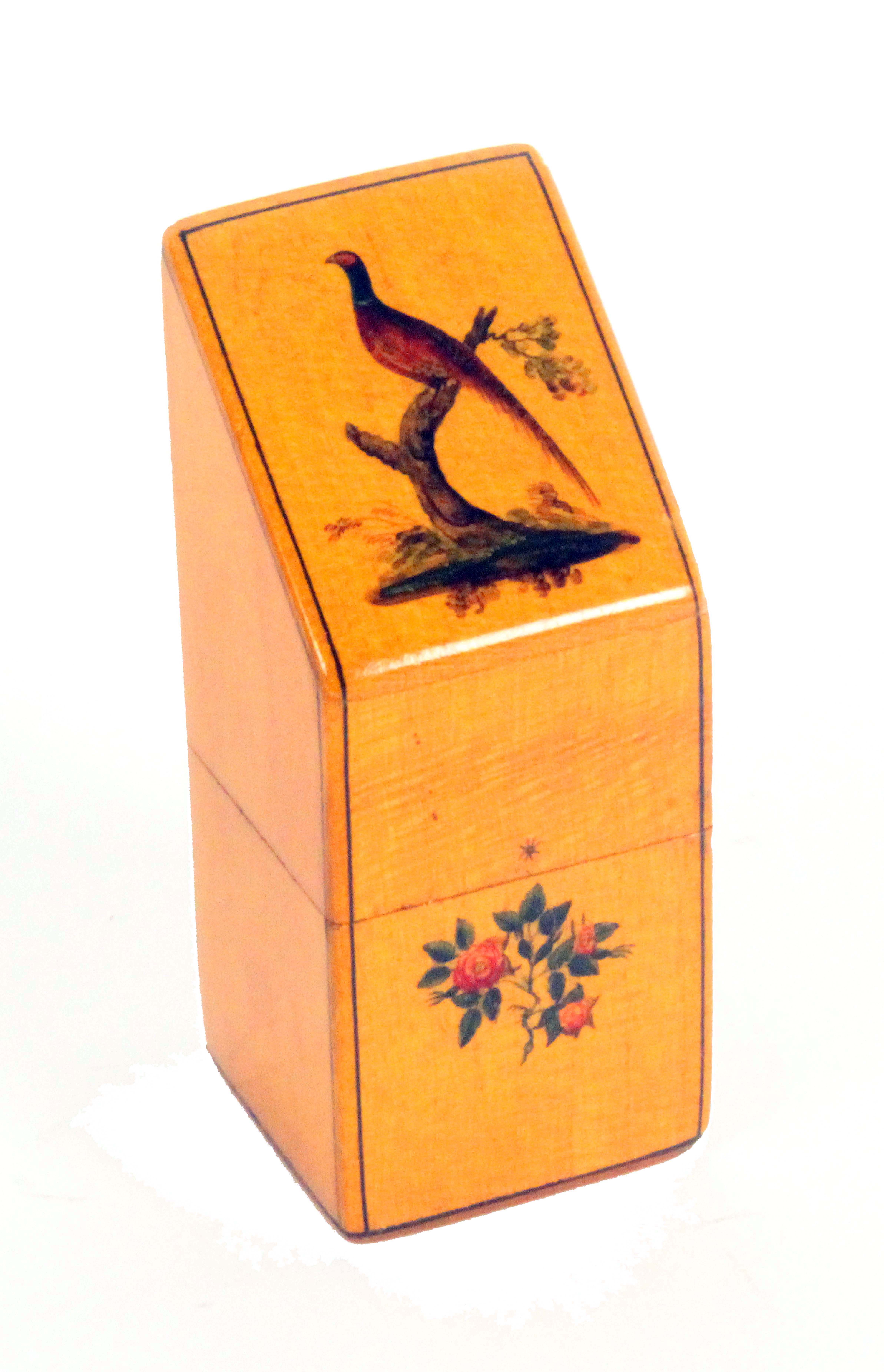 A fine Mauchline ware slant top needle packet box, in sycamore, the front with a polychrome