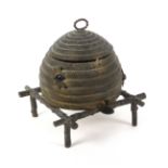 An unusual gilt metal sewing casket in the form of a bee skep, circa 1870, the surface dull,