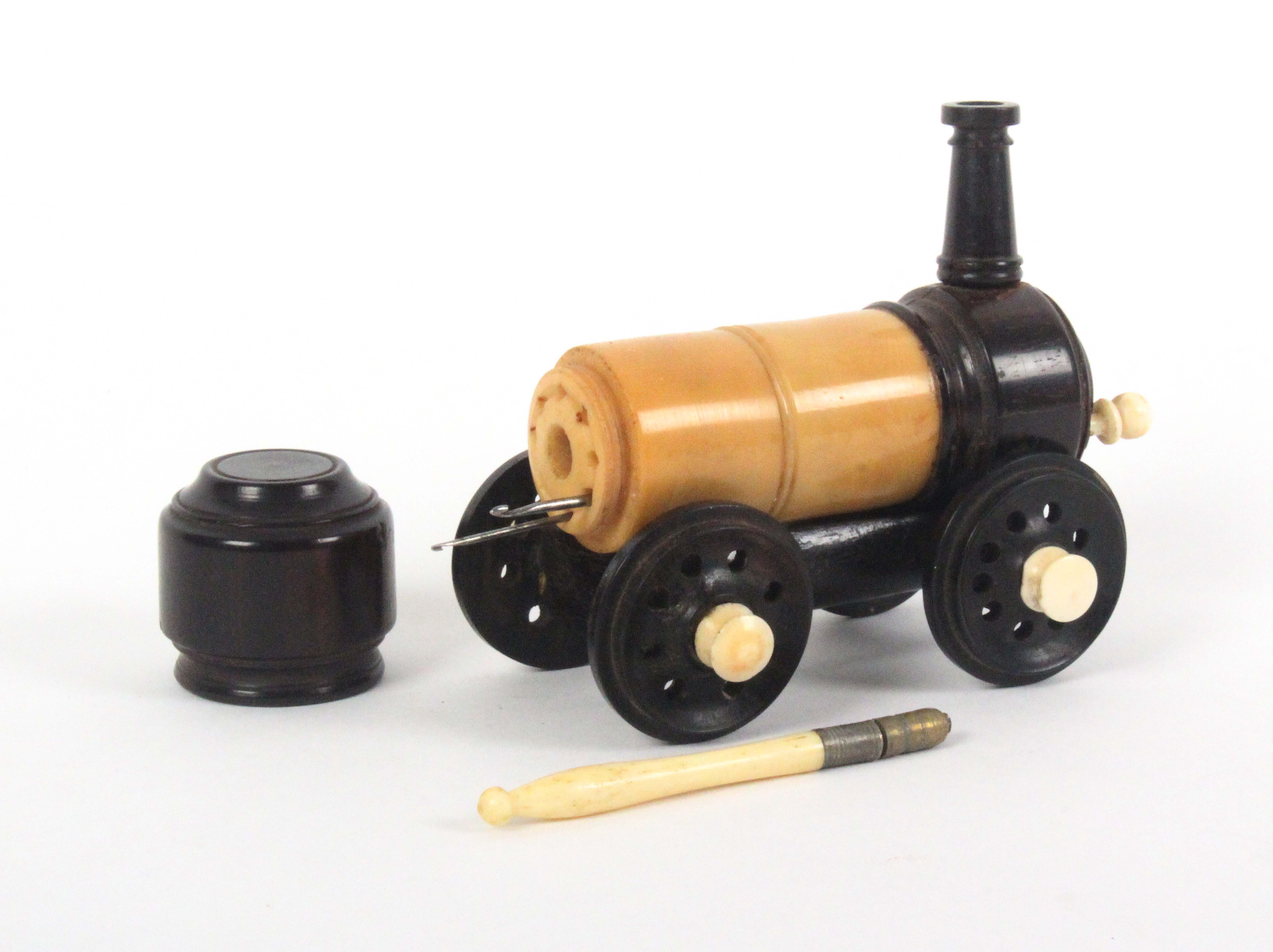 A rare crochet set contained in a model of a steam locomotive, in vegetable ivory, rosewood and - Image 2 of 3