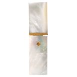 A Palais Royal mother of pearl needle case, of plain rectangular form, one side with a circular gilt