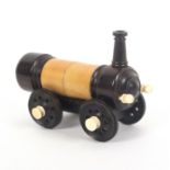 A rare crochet set contained in a model of a steam locomotive, in vegetable ivory, rosewood and