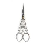 A fine pair of early 19th Century engraved and file cut polished steel scissors, the diamond section