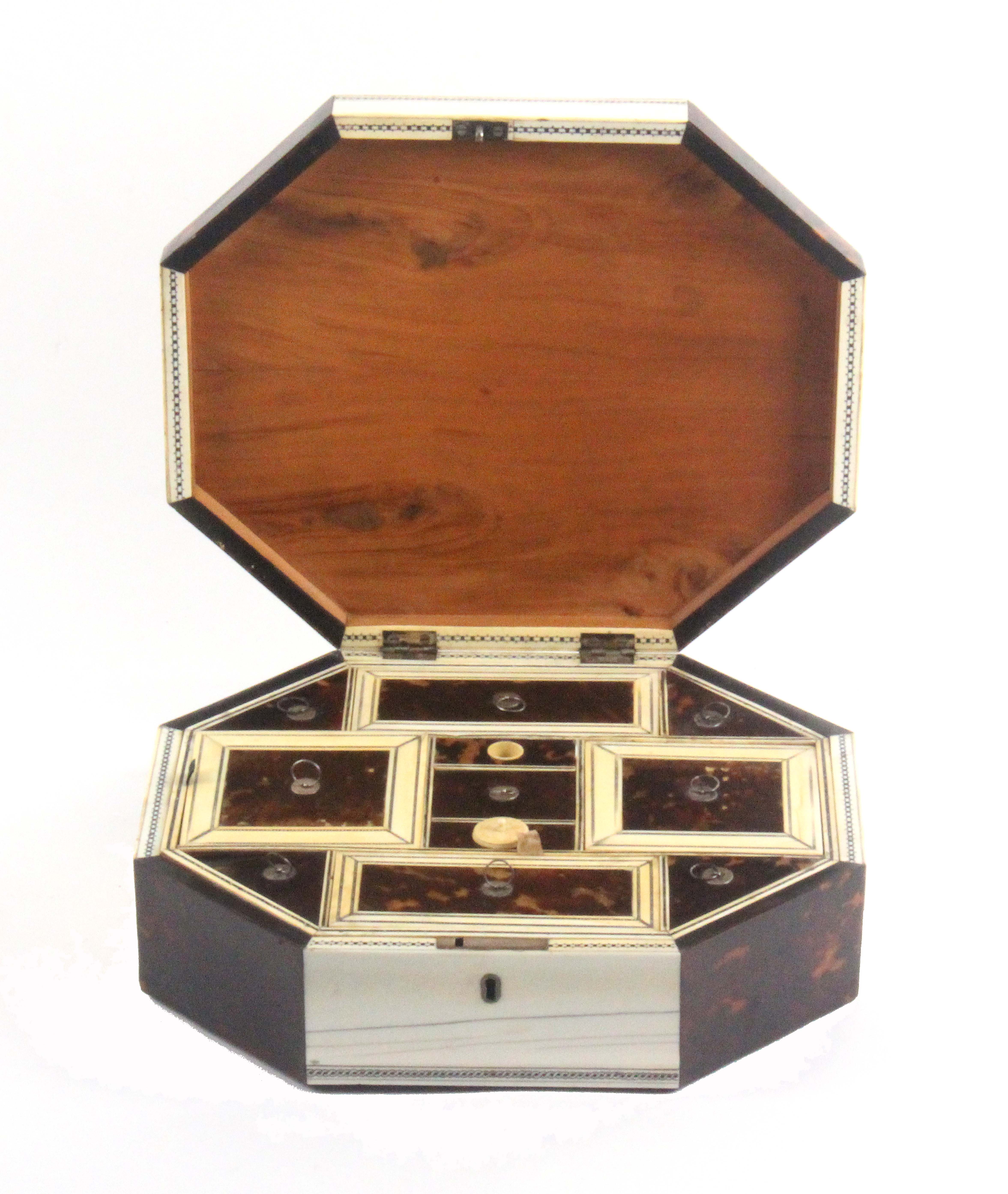 An early 19th Century Anglo-Indian sandal wood, ivory and tortoiseshell sewing box of octagonal - Image 2 of 2