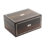 A mid Victorian coromandel wood rectangular sewing box, the front and top inlaid with bands of