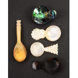 Five caddy spoons, comprising two mother of pearl examples with carved handles, largest 7.5cms,