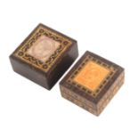 Two Tunbridge ware stamp boxes, each rectangular, one with purple Q.V. young head stamp within