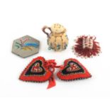 Five home made material bead decorated pin cushions, comprising an example in the form of a lidded