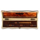 A fine gold handled tambouring set, circa 1850, contained in a rectangular tortoiseshell case, the