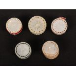 Five mother of pearl disc form emeries, each with variant cut designs, largest 2.5cms.     (5)