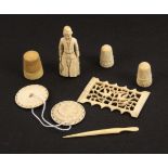 A mixed lot - sewing, 19th Century ivory and bone pieces comprising a Dieppe carved fisherman needle