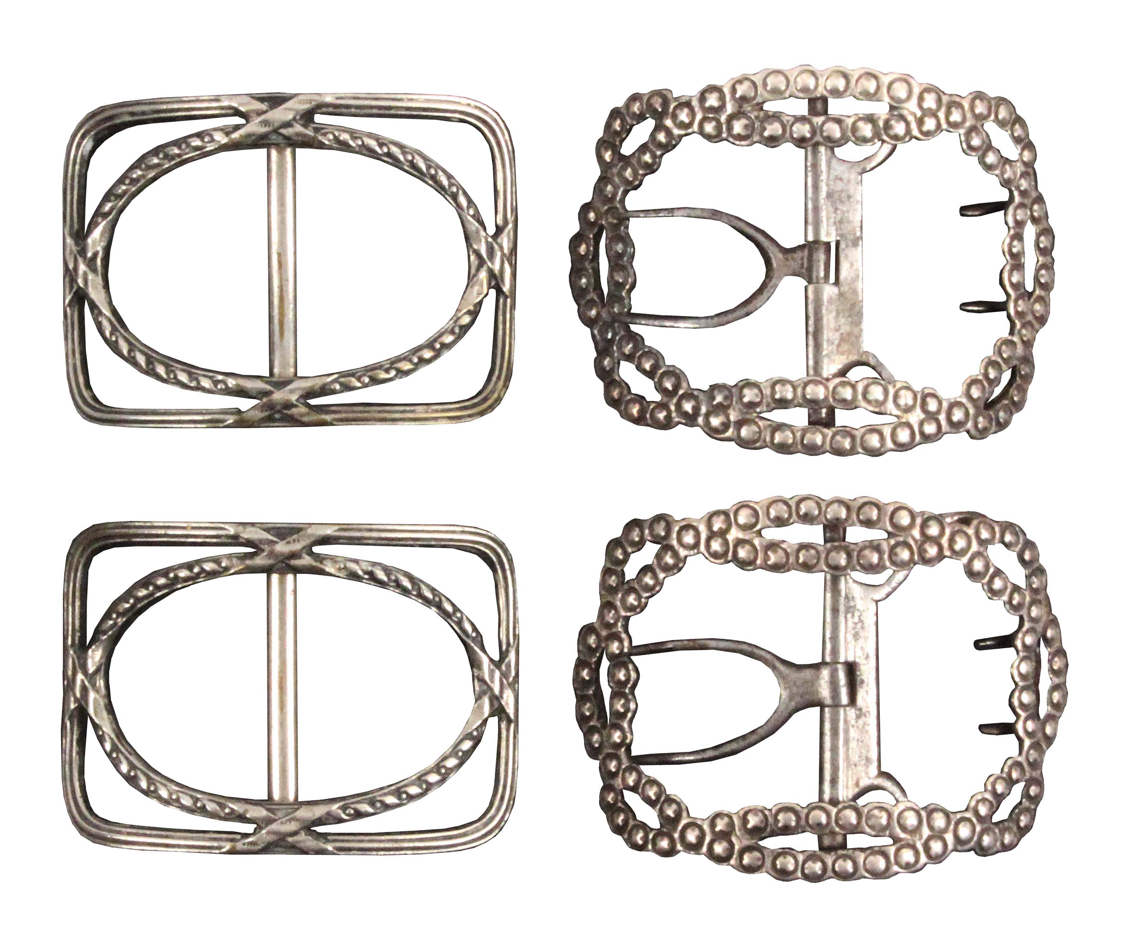 Two pairs of Georgian shoe buckles, comprising a silver mounted pair in imitation of steel work,