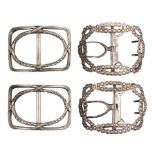 Two pairs of Georgian shoe buckles, comprising a silver mounted pair in imitation of steel work,