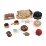 Twelve pin cushions and pin retainers, including a late 18th Century layette example inscribed '