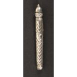 An unusual early 19th Century silver needle case, of tapering form each side with chevron motifs and