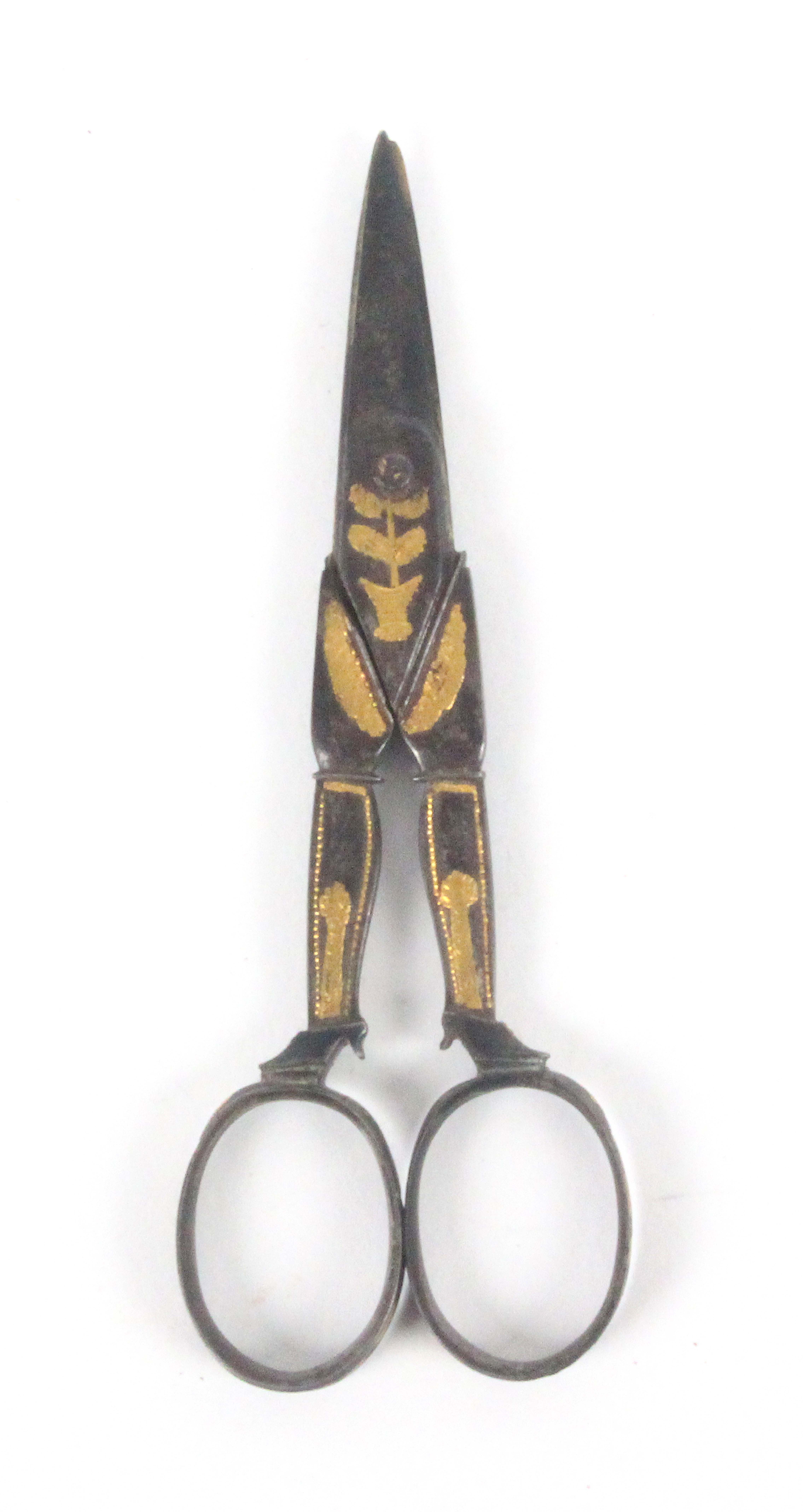 A pair of late 18th Century gold mounted steel scissors, English or French, short tapering blades