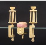 Three 19th Century carved ivory Chinese sewing clamps, comprising a pair of winding clamps, the