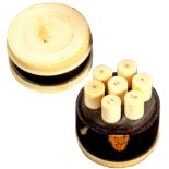 A fine early 19th Century lignum vitae and ivory mounted multiple needle box, of cylinder form