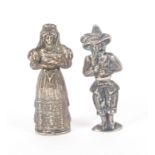 Two continental silver figural needle cases, one in the form of a standing woman with elaborate hair