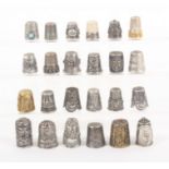 Twenty four continental silver and other thimbles, mostly 20th Century.    (24)
