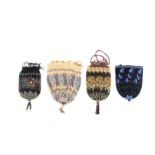 Four 19th Century bead work draw string bags, three with floral decoration, one with leaves only,