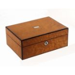 A burr, maple and ebony bordered sewing box of rectangular form, with mother of pearl escutcheon and