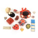 A group of larger format pin cushions and other pieces, comprising a wool work Union Jack pin