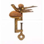 A gilt metal hemming bird sewing clamp, the leaf decorated rectangular frame with pin cushion